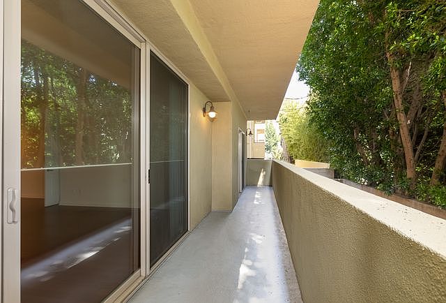 view from sliding glass doors; living room & both bedrooms