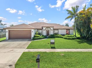 111 Meadow Woode Drive, Royal Palm Beach, FL 33411