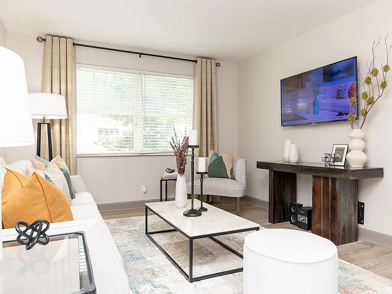 Spacious living room with hardwood-style flooring