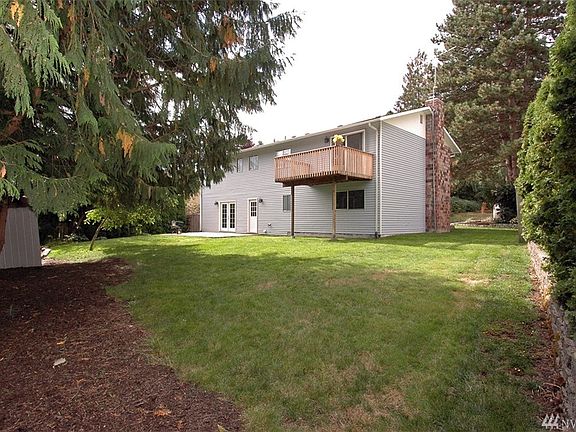 Brand new deck off of dining/living room area. Beautiful backyard.  Fully fenced.  New gates installed to the right of the house.