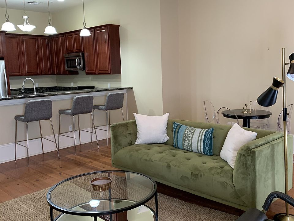 Un-furnished apartment only needs your kitchenware and small appliances, bed and bath linens and you