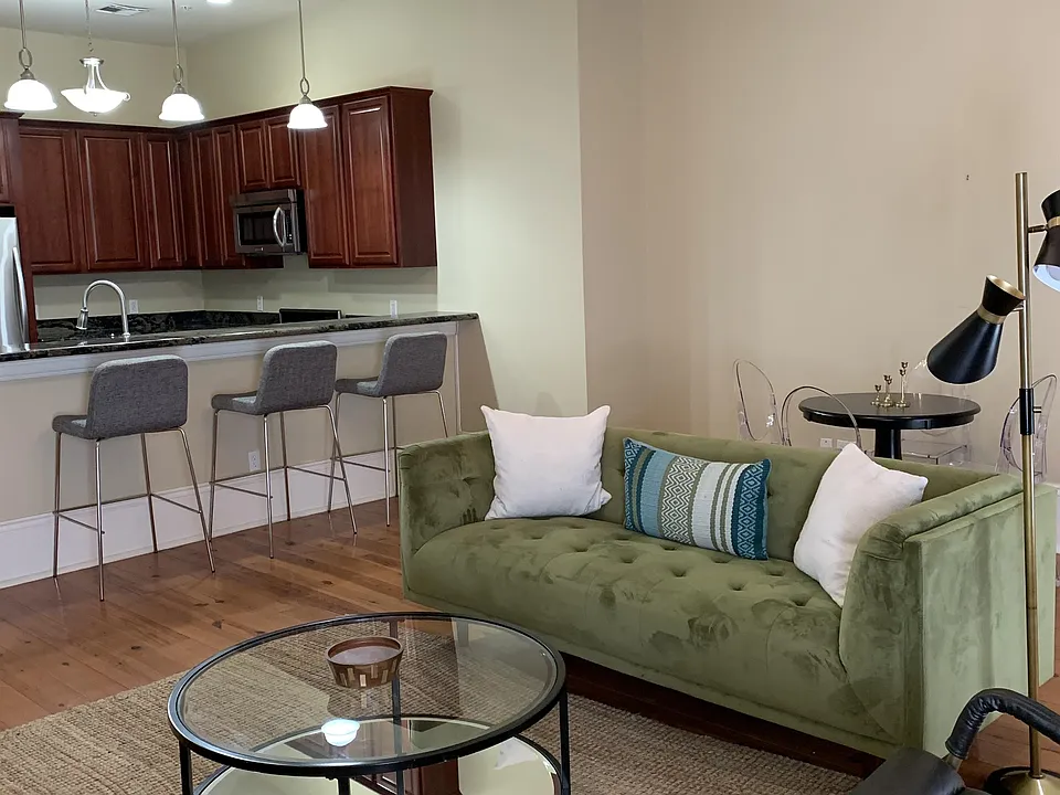 Un-furnished apartment only needs your kitchenware and small appliances, bed and bath linens and you