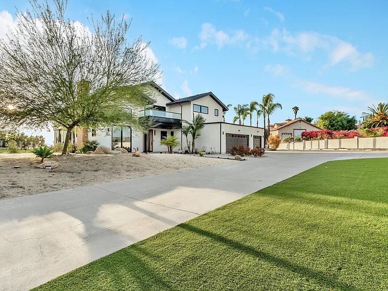 The front area has artificial turf and dg areas for kids and grown up play area. This is also at the end of the cul-de-sac ideal for kids play and biking!