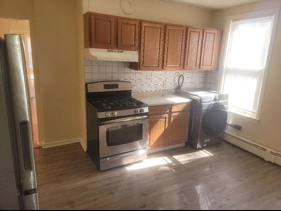 Stainless Steel Washer, Stove , and Refrigerator