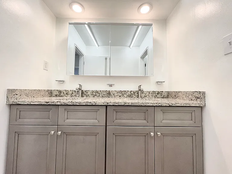 Large double granite top vanity