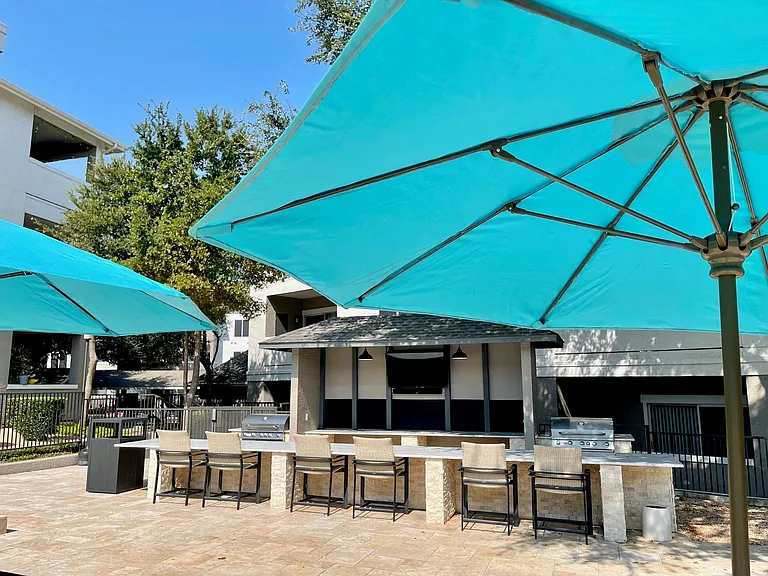 Outdoor lounge with gas grills
