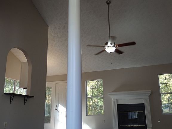 Family Room with fireplace and cathedral ceilings