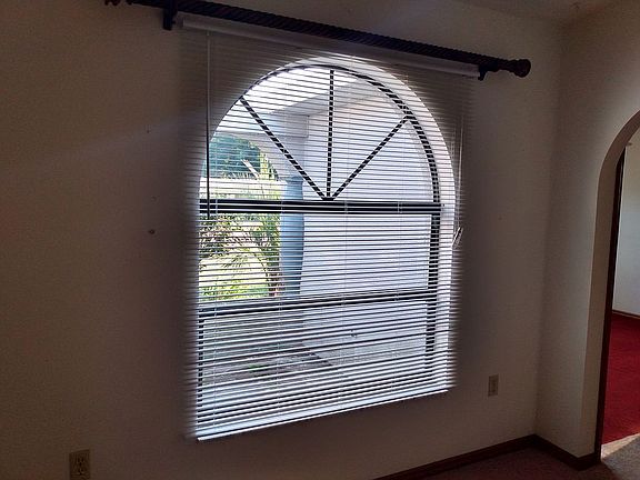 Large arched front window