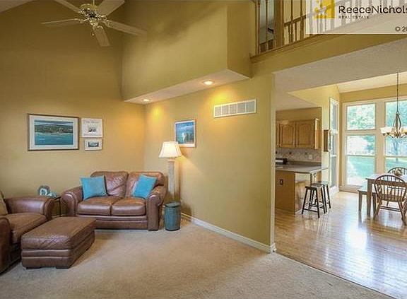 Living area opens to kitchen/dining area.