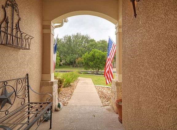 An arched entrance invites you to see more.