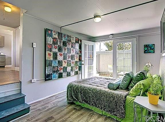 Downstairs bedroom with french doors.