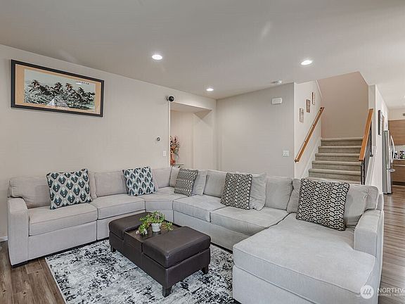 Spacious living area thoughtfully designed with an open layout.>