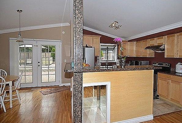 Large kitchen with granite counters