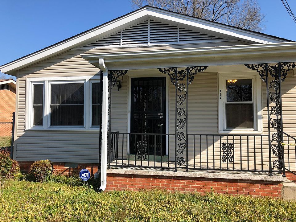 Great curb appeal. Vinyl siding, iron railing on porch. Great fenced-in yard in very nice, quiet neighborhood. Convenient location.