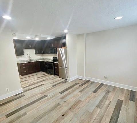 Kitchen, open concept to living room.