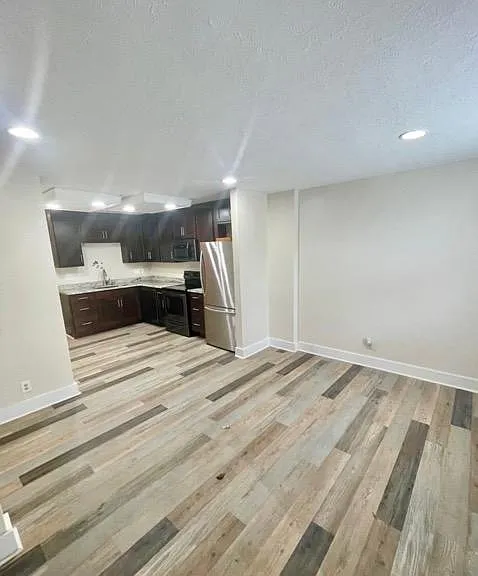 Kitchen, open concept to living room.