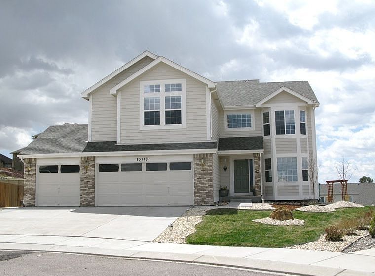 Front of Home. Sits on large lot in cul-de-sac. 