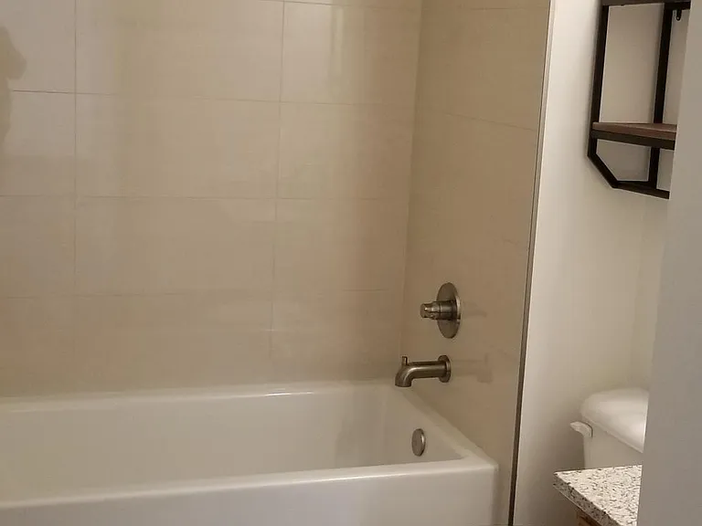 Main bathroom at end of hall
