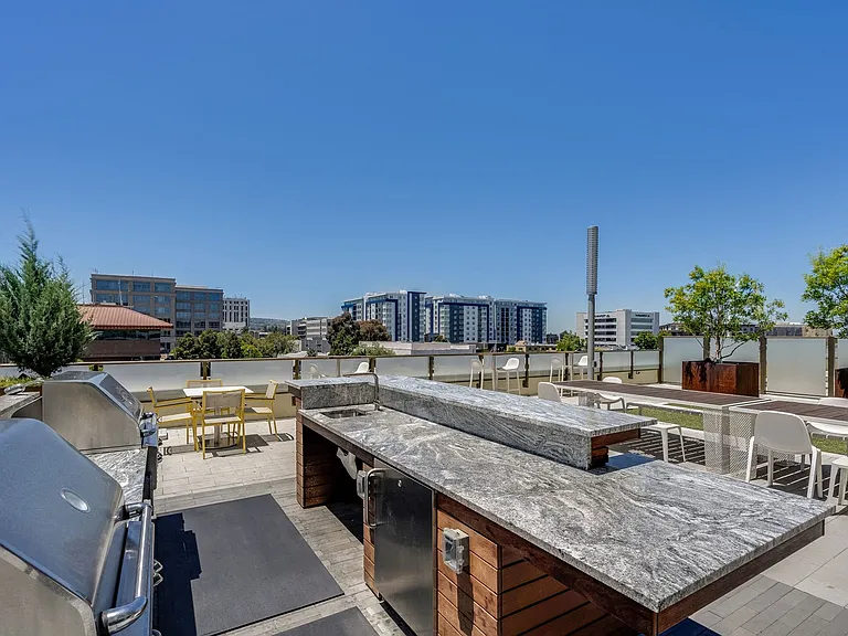 Outdoor social space with BBQ grills
