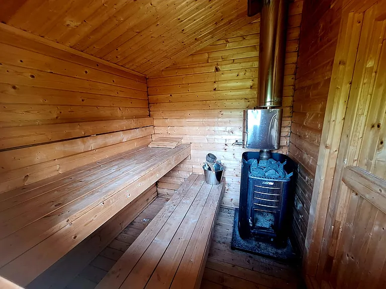 Enjoy exclusive access to a private outdoor sauna_perfect for relaxing after work, travel, or a day of exploring.
