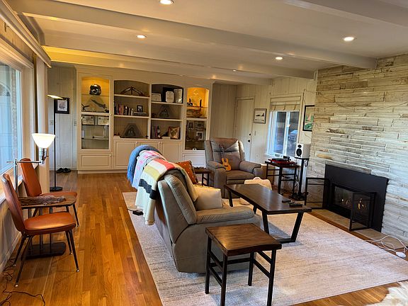 Living space with gas fireplace, recessed lighting and dimmers