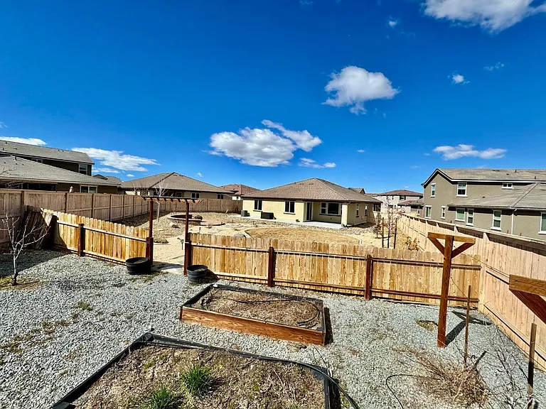 3 large gardening beds (with water) in the backyard