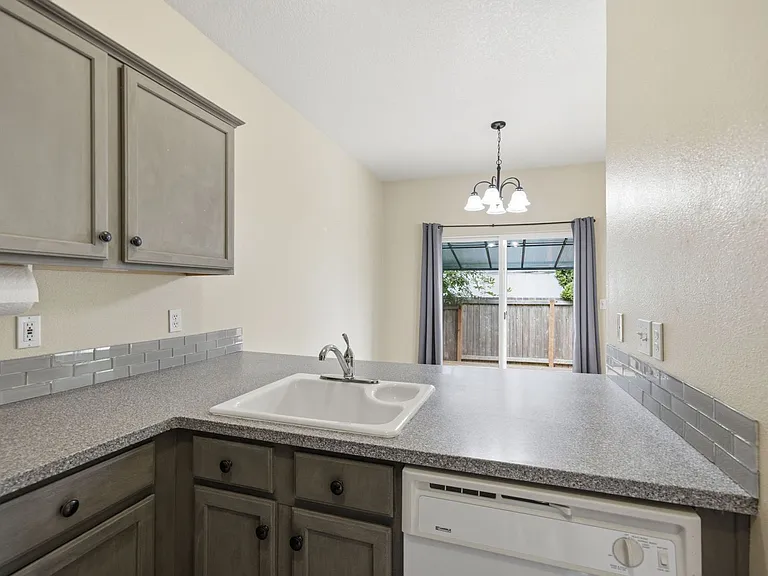 1499 NE Birkshire Ct — Photo 11
