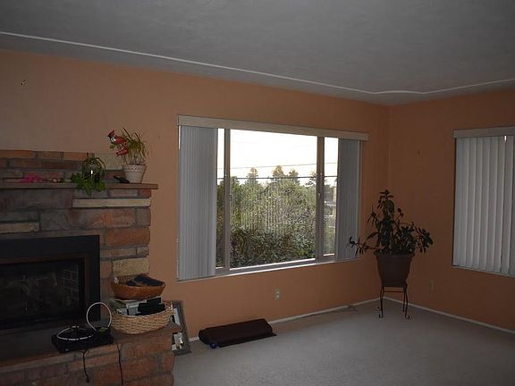 Spacious Living room with awesome ocean view, plenty of space for entertainment center and furniture to settle into to enjoy cozy times by the electric fireplace. Carpet was cleaned using state of the art equipment Jan 8. (we are removing all personal be