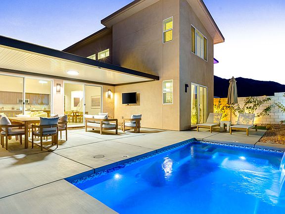 The house glows at sunset _ pool nights are about to get good.