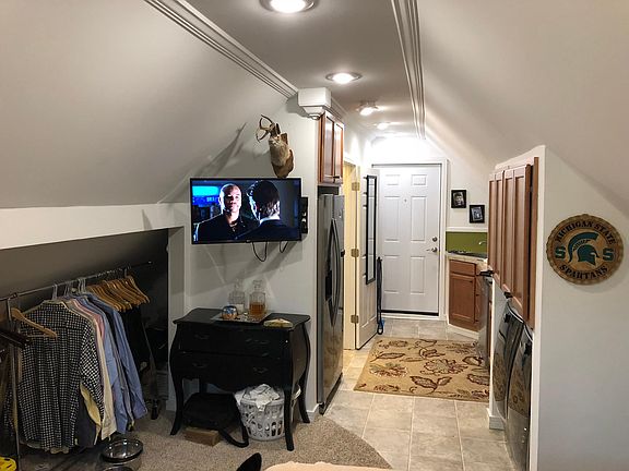 Articulating Smart TV swings to watch from bed, chair, or desk. Large closet