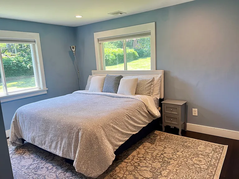 Primary Bedroom w/ En-Suite Bathroom