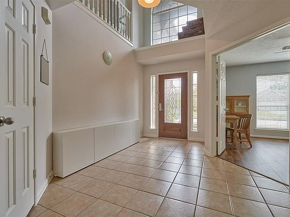The home has been updated in fresh neutral tones.