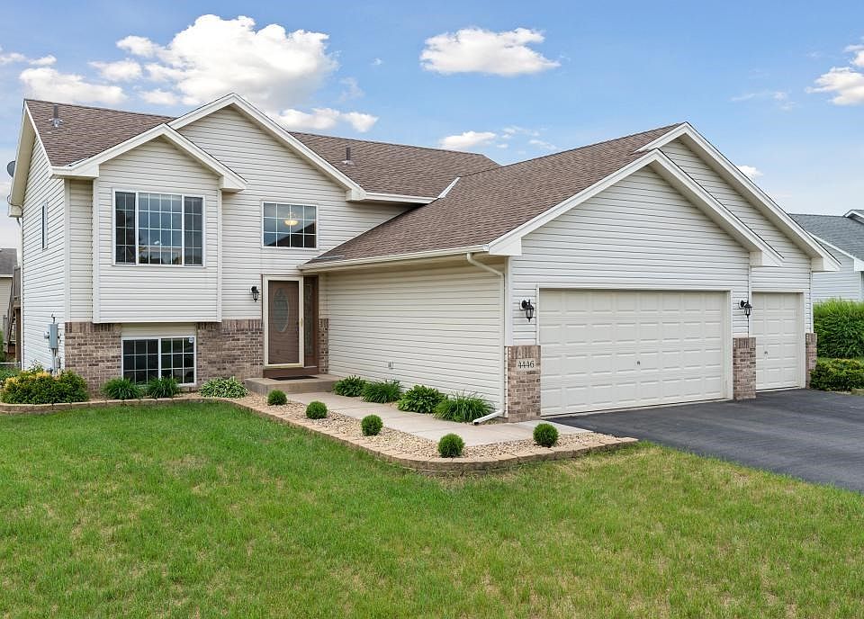 Low maintenance vinyl, clean lines and low maintenance landscaping.