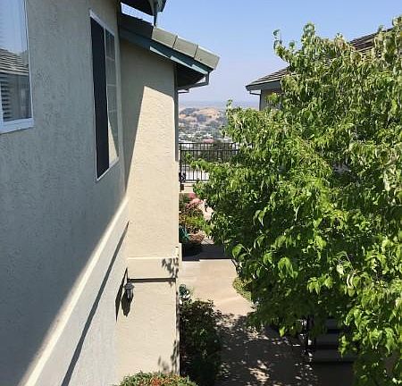 Outside the entry of the unit.