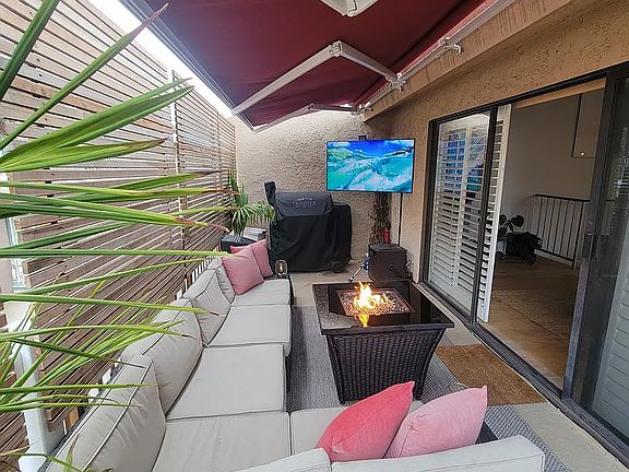 outdoor deck with rectractable remote control awning