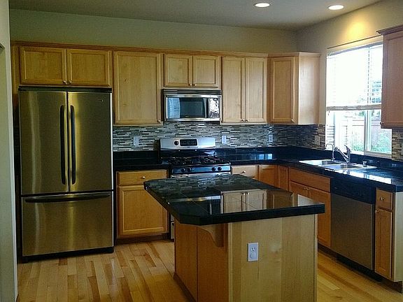 Kitchen with all stainless steel appliances