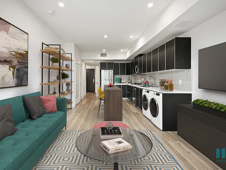 Open-Concept Kitchen, Dining, and Living Room with In-Suite Washer and Dryer - Spruce Floor Plan