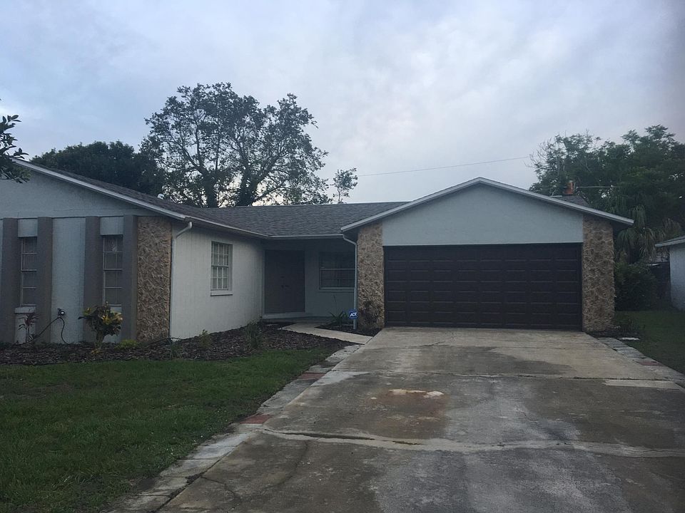 Front View with Garage Door