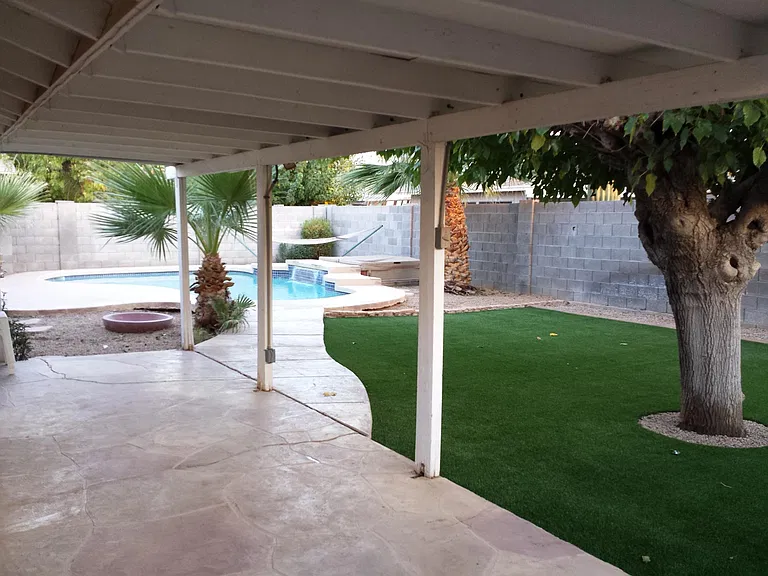 Backyard with Pool, Hottub, firepit and turf, great shade tree