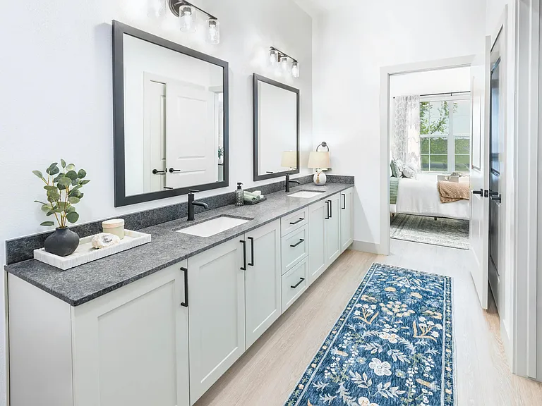Upgrade your routine with bathrooms featuring double vanities, sleek granite countertops, and designer matte black plumbing fixtures.