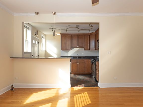 Updated Kitchen has room for stools on both sides.