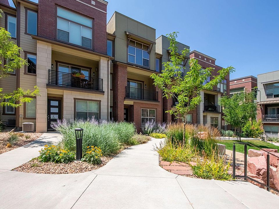 Front of townhome and courtyard.