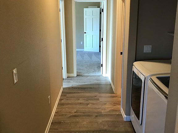 Laundry off hallway, washer and dryer provided