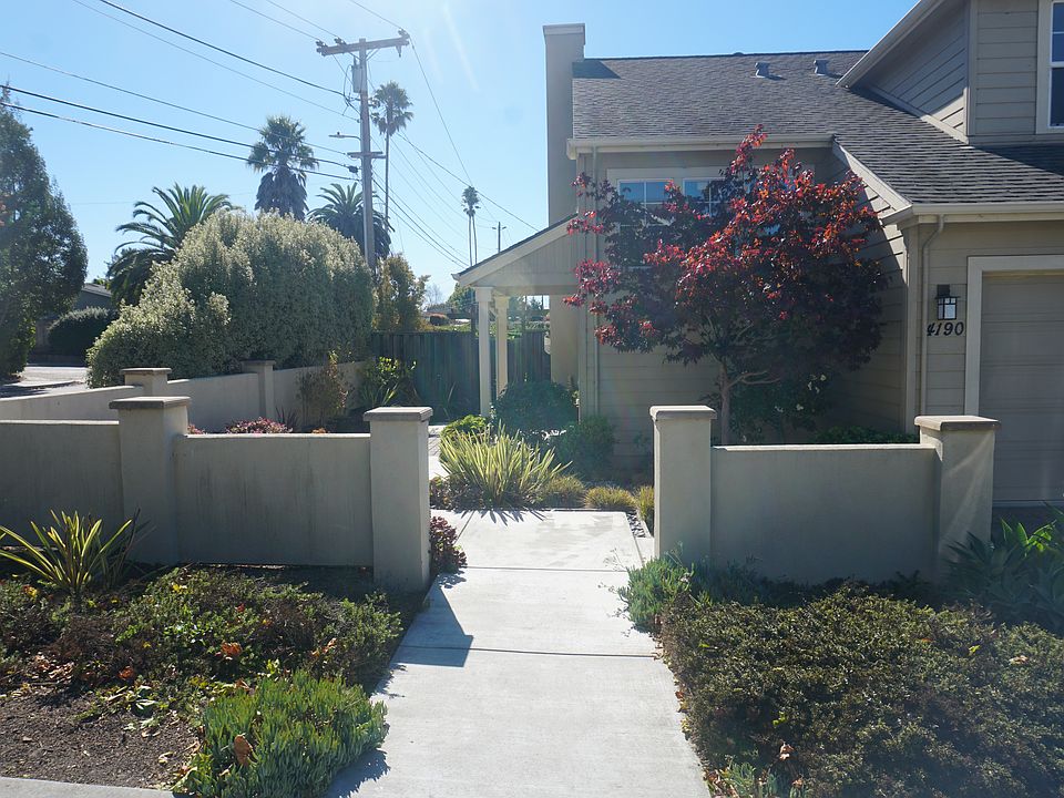 Private entrance to front door. This is a corner lot.
