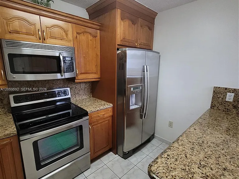 1114 NW 124th Ct #101 — Photo 9