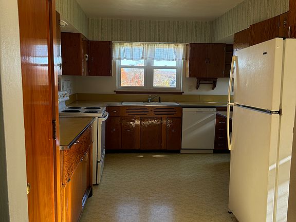 Large kitchen, refrigerator, stove and dishwasher included