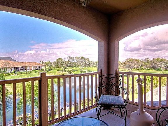Balcony view over lake.
