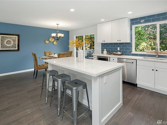 Gorgeous kitchen with Pental Quartz Countertops, Stainless appliances and fixtures