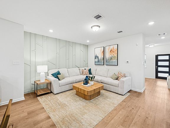 Family Room. Sample image for illustration upgrades, options, and colors may vary.