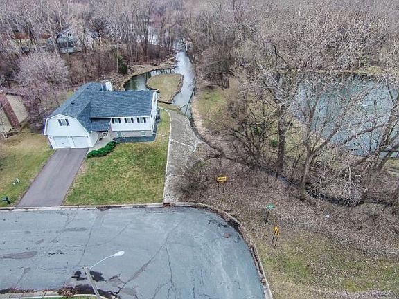 Aerial picture allows you to see the ponds in the rear and side of the home. Pond on right has fountain!